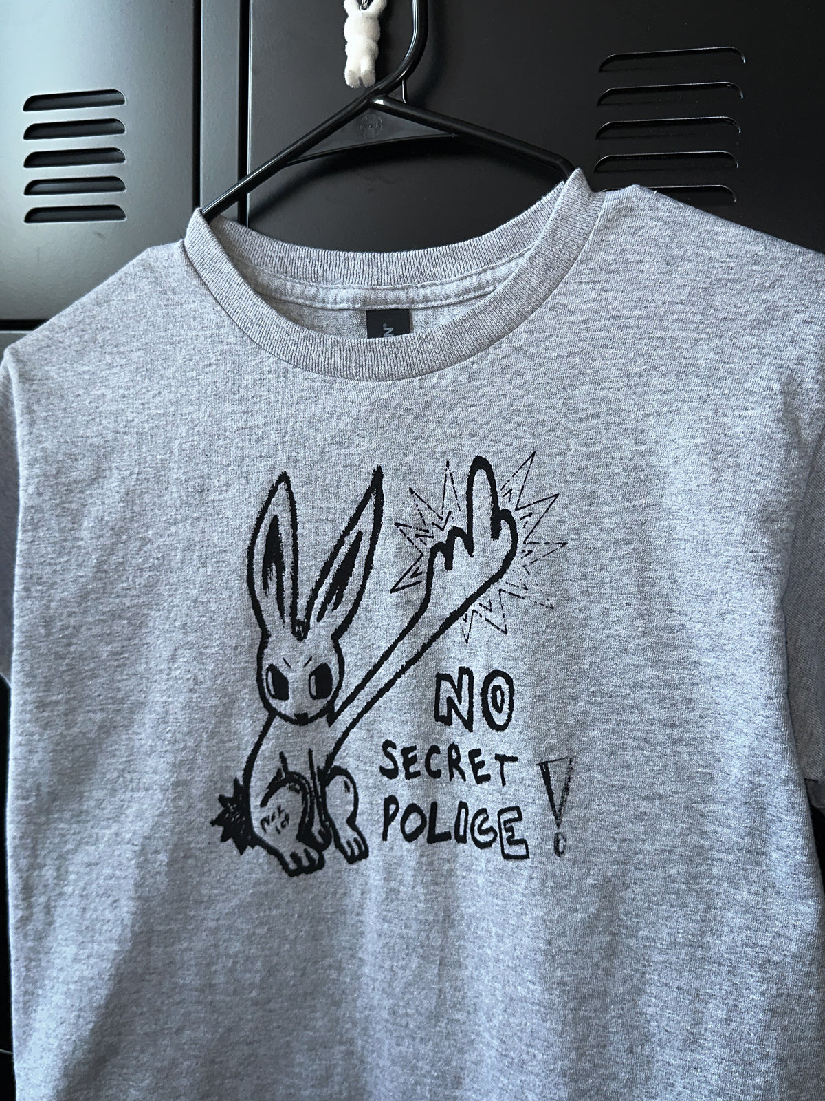 NO SECRET POLICE baby tee *