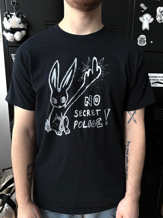 NO SECRET POLICE unisex tee *